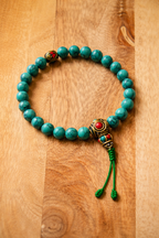 Bracciale Turchese 8 mm con Elementi in Metallo – Energia e Protezione